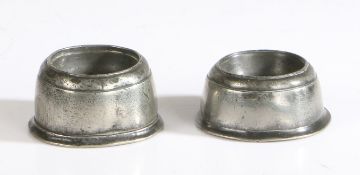 A MATCHED PAIR OF WILLIAM & MARY PEWTER TRENCHER SALTS, CIRCA 1700.