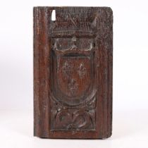 AN EARLY 16TH CENTURY CARVED OAK ROYAL ARMORIAL PANEL, CIRCA 1500-20.