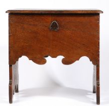 A HIGHLY UNUSUAL WILLIAM & MARY OAK BOARDED BOX-STOOL, CIRCA 1690.