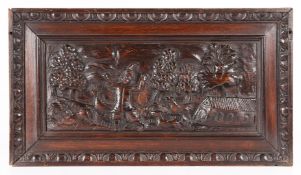 A RARE OAK CARVED PANEL OF NOAH AND HIS ARK, FLEMISH, CIRCA 1600.