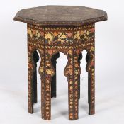 AN EARLY 20TH CENTURY MOORISH TABLE OF OCTAGONAL FORM.