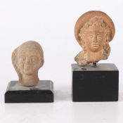 TWO ANCIENT ETRUSCAN TERRACOTTA BUSTS, CIRCA 3RD-2ND CENTURY B.C (2).