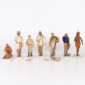 A SET OF SEVEN LATE 19TH/EARLY 20TH CENTURY INDIAN CLAY FIGURES.