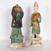 TWO CHINESE POTTERY TOMB ATTENDANTS.