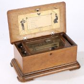 AN EARLY 20TH CENTURY SWISS SIX SONG MUSIC BOX.