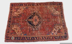 A NORTH WEST PERSIAN HERIZ RUG, CIRCA 1920-30.