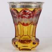A 19TH CENTURY BOHEMIAN AMBER GLASS BEAKER, CIRCA 1880.