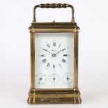 A 20TH CENTURY BRASS REPEATING CARRIAGE CLOCK BY ANGELUS, FRENCH.