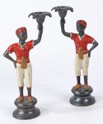 A PAIR OF 20TH CENTURY COLD PAINTED BRONZE 'BLACKAMOOR' FIGURAL CANDLESTICKS, 27CM HIGH (2).