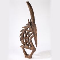 A EARLY 20TH CENTURY WEST AFRICA TJI-WARA BAMARA TRIBE HEADREST IN THE FORM OF AN ANTELOPE.