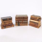 A COLLECTION OF 18TH AND 19TH CENTURY LEATHER BOUND BOOKS.