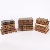 A COLLECTION OF 18TH AND 19TH CENTURY LEATHER BOUND BOOKS.