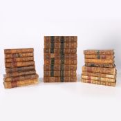 A COLLECTION OF 18TH AND 19TH CENTURY LEATHER BOUND BOOKS.