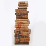 A COLLECTION OF 18TH AND 19TH CENTURY LEATHER BOUND BOOKS.