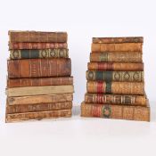 A COLLECTION OF 18TH AND 19TH CENTURY LEATHER BOUND BOOKS.