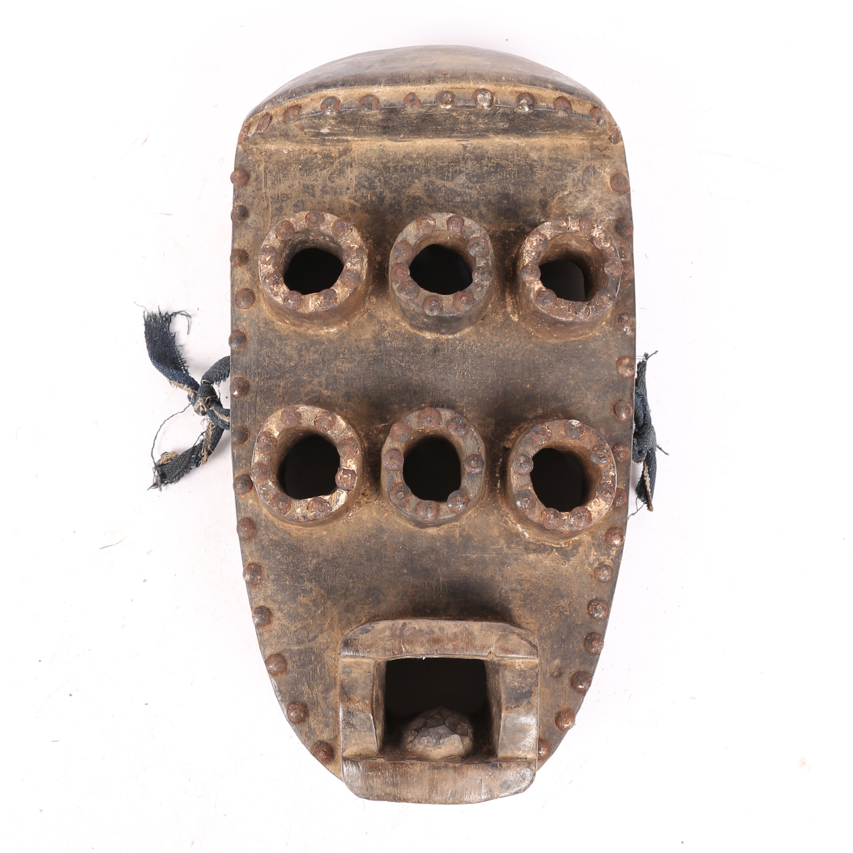 A GREBO KRU MASK, LIBERIA.