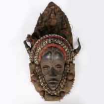 A DAN MASK, IVORY COAST/COTE D'IVOIRE.