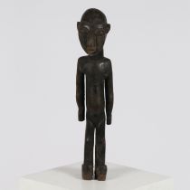 A CENTRAL AFRICAN CARVED STANDING FIGURE, CAMEROON.
