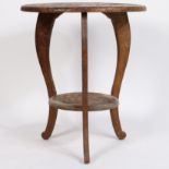 A 20TH CENTURY CARVED OCCASIONAL TABLE.