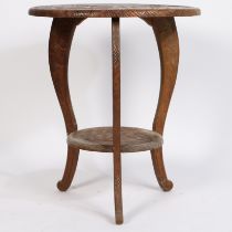 A 20TH CENTURY CARVED OCCASIONAL TABLE.