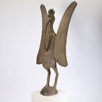 A UNUSUALLY LARGE SENUFO STANDING BIRD, IVORY COAST/COTE D'IVOIRE.