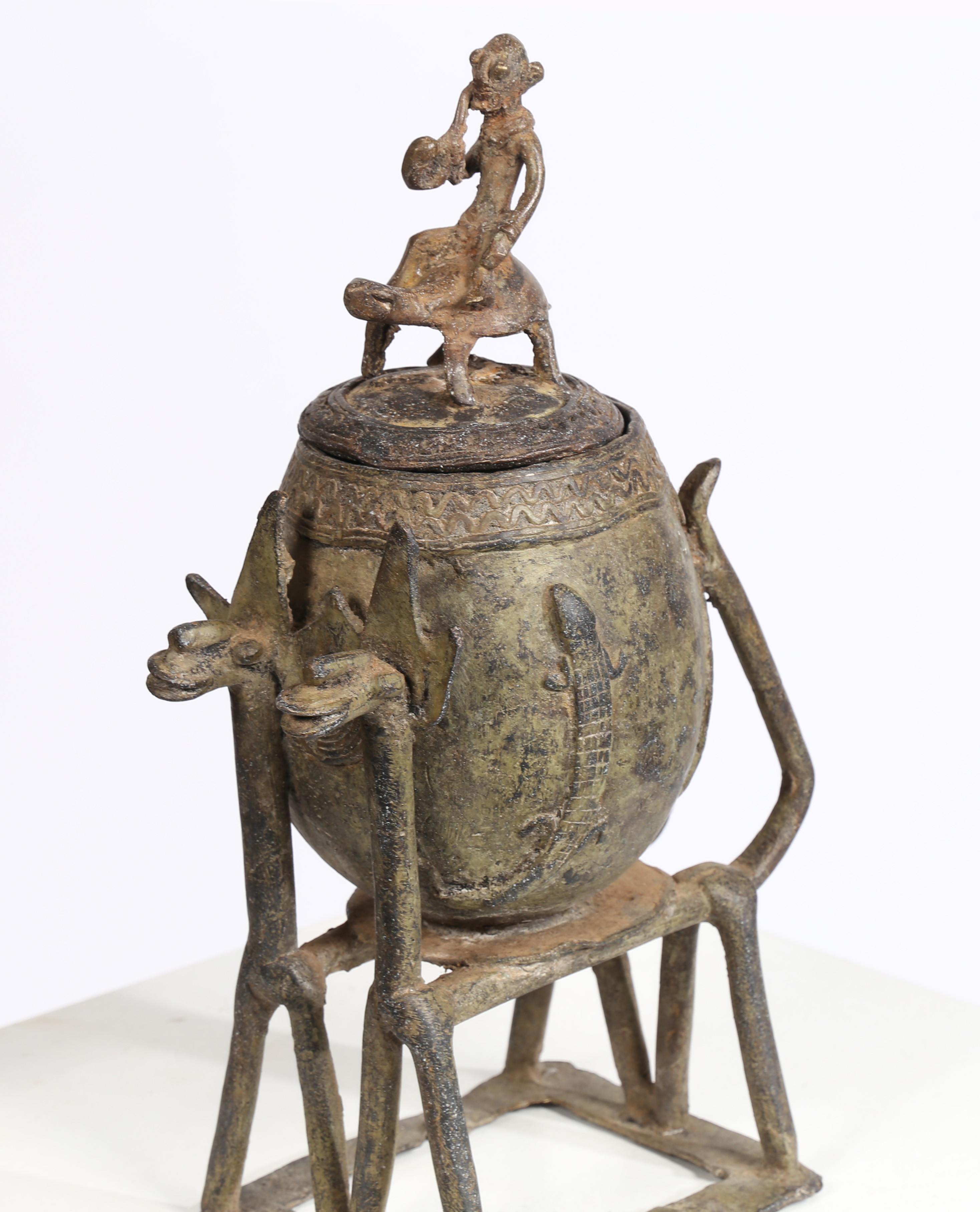 A DOGON BRONZED MEDICINE CONTAINER CARRIED BY TWO HORSES, MALI. - Image 3 of 8