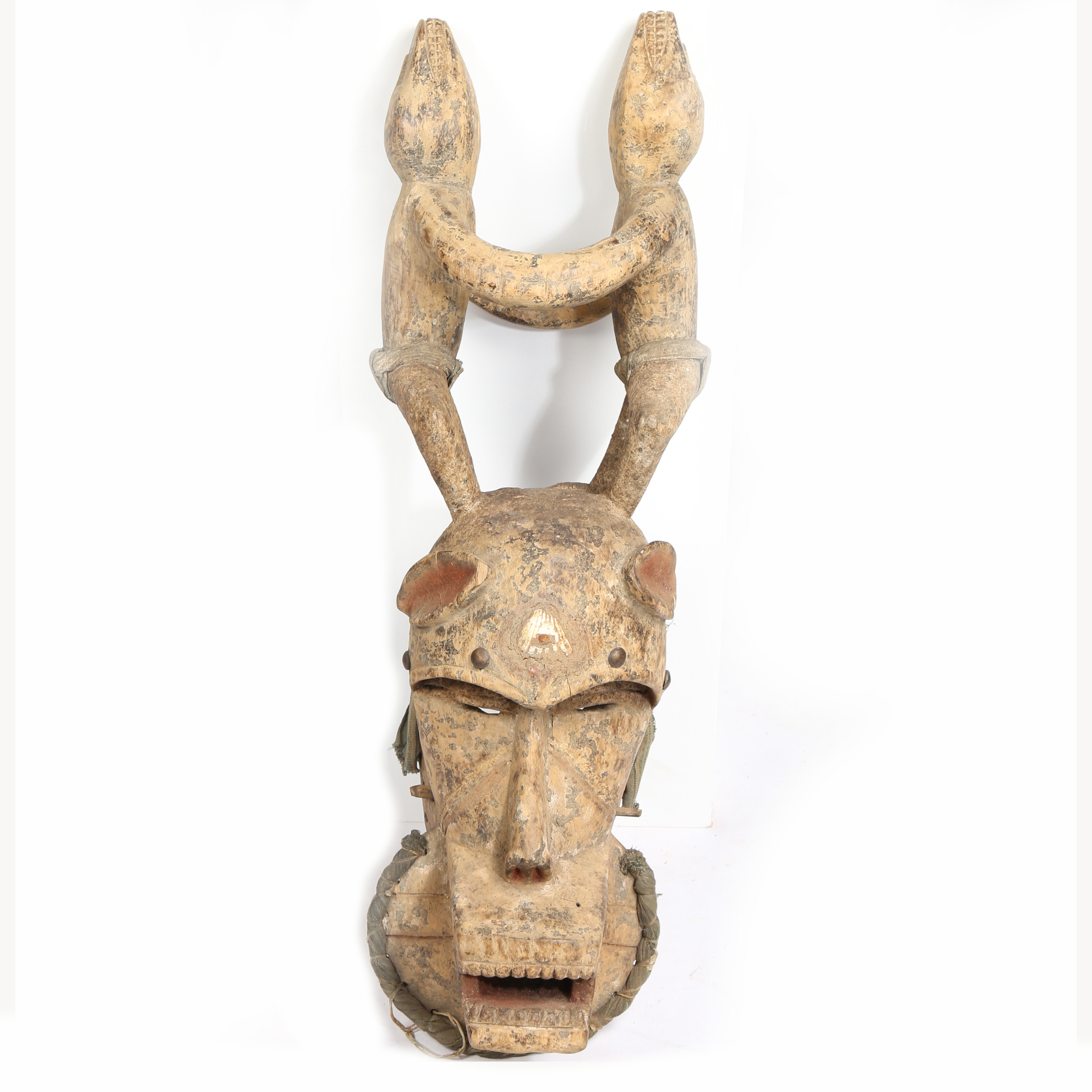 A LARGE BAULE ZOOMORPHIC MASK, IVORY COAST/COTE D'IVOIRE.