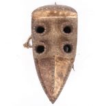 A GREBO KRU WARRIOR MAOU MASK, LIBERIA.