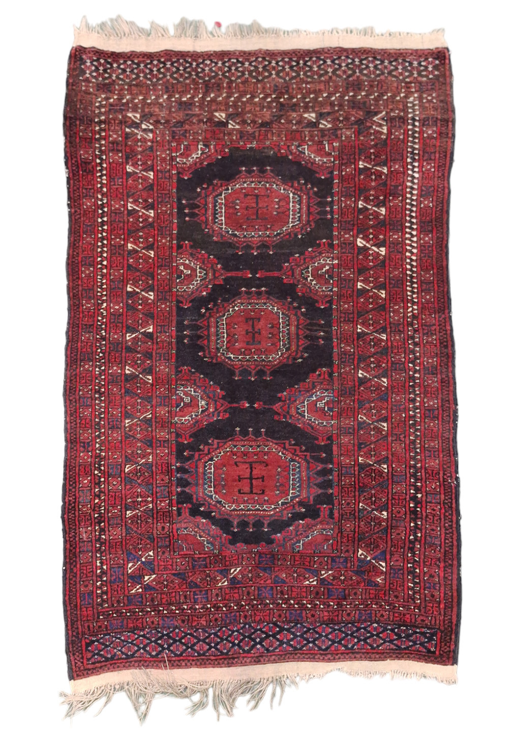 AN AFGHANISTAN RUG.