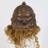 A MENDE HELMET MASK, SIERRA LEONE.