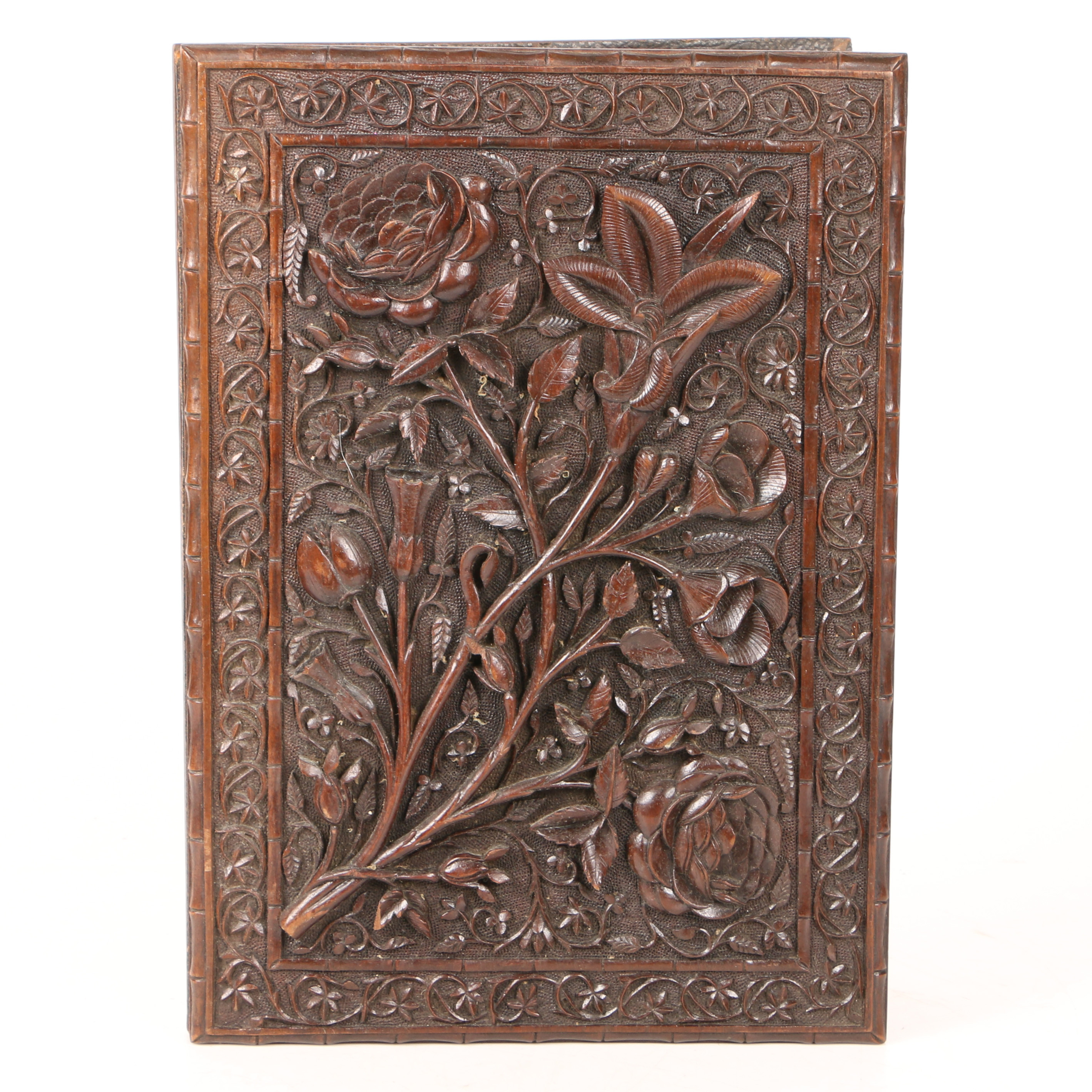 A 19TH CENTURY ANGLO INDIAN HARDWOOD BOOK COVER.