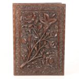 A 19TH CENTURY ANGLO INDIAN HARDWOOD BOOK COVER.