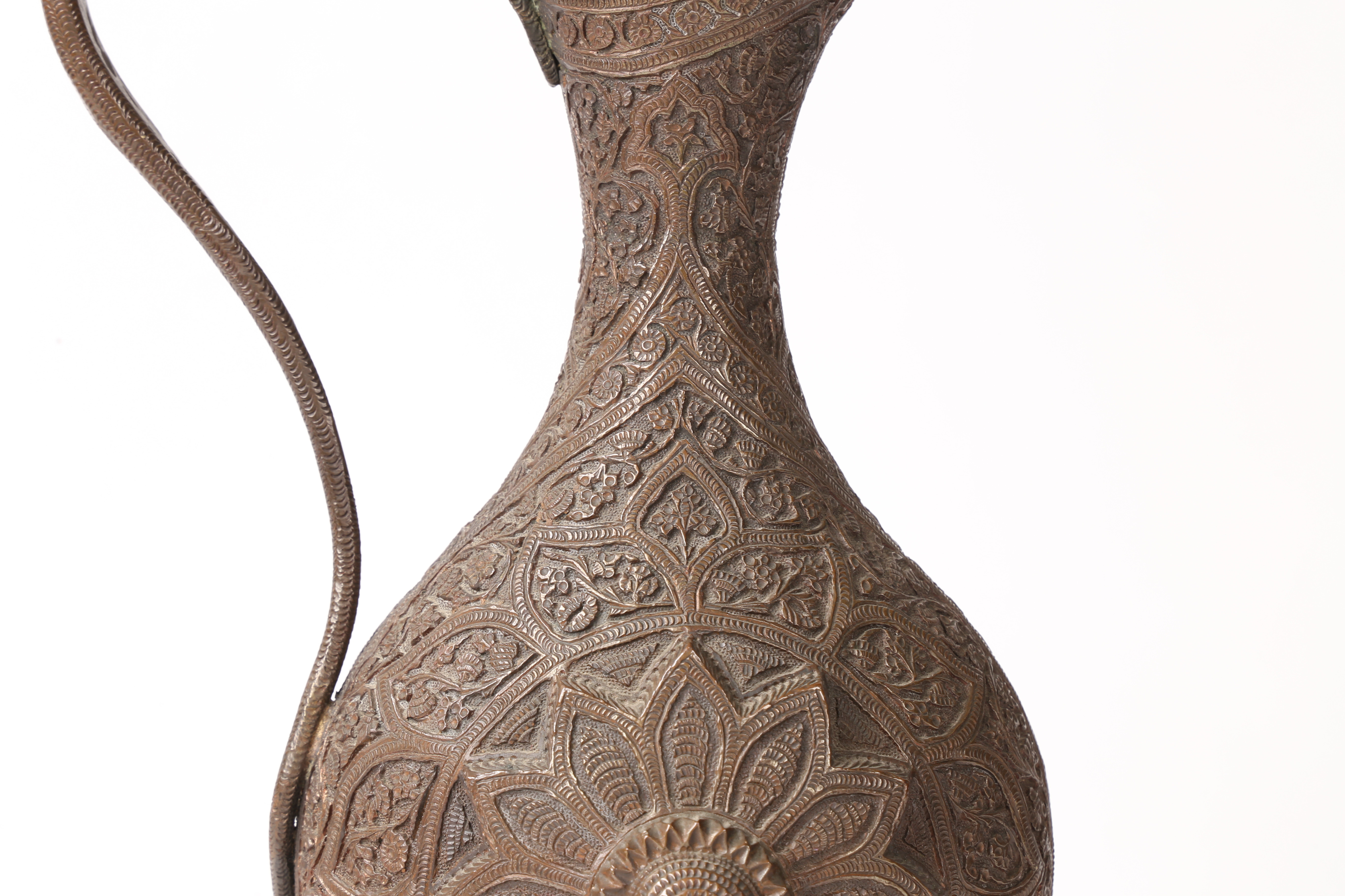 A 19TH CENTURY PERSIAN COPPER EWER. - Image 3 of 11