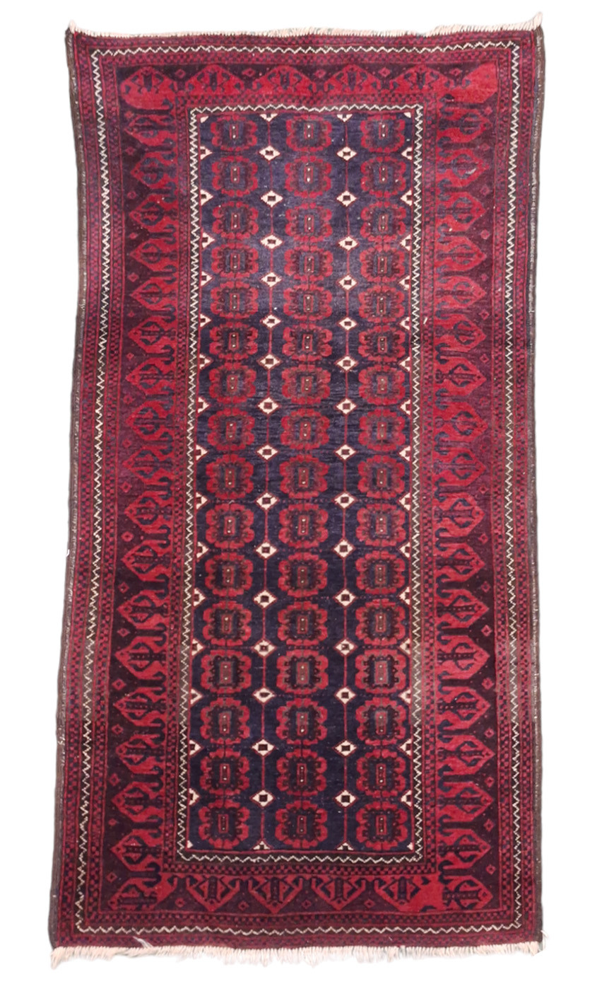 A BALUCH RUG.