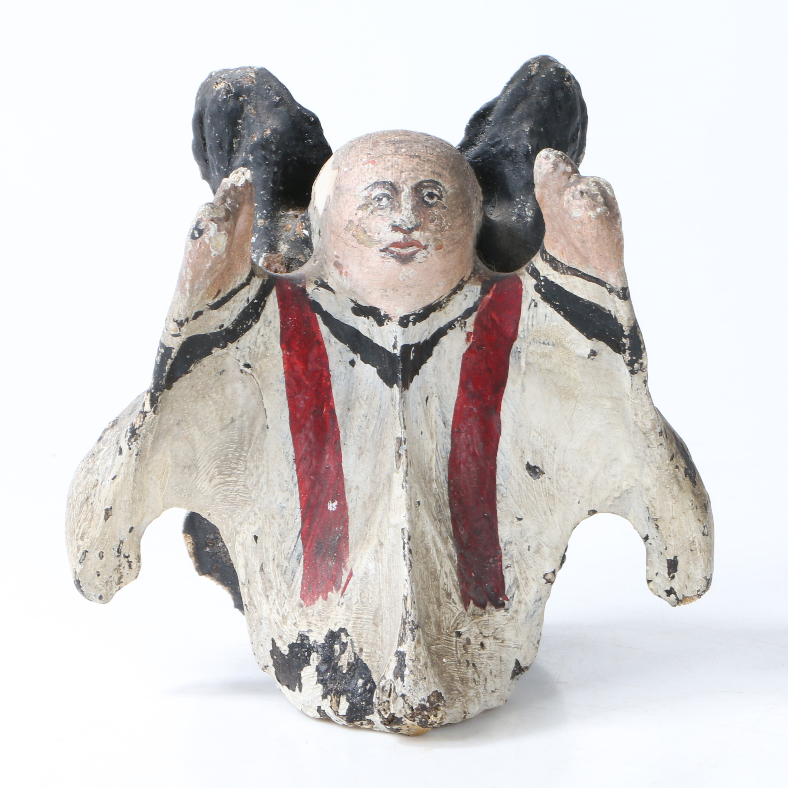 A UNUSUAL 19TH CENTURY PAINTED WHALE VERTEBRAE IN THE FORM OF JOHN WESLEY.