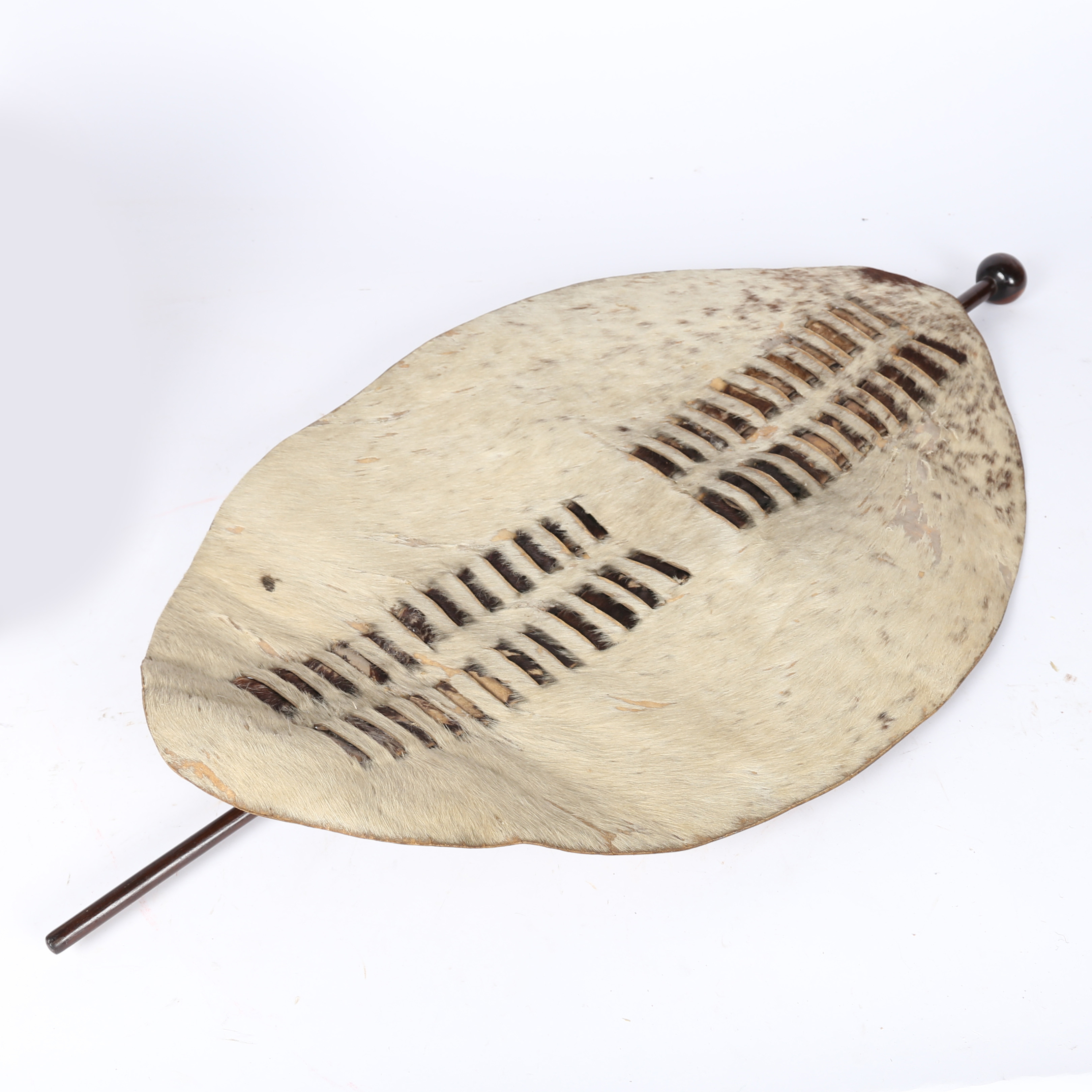 A ZULU UMBHUMBHULOSU WARIORS HIDE SHIELD, SOUTH AFRICA.