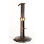 AN UNUSUAL GEORGE III SHEET-IRON HOGSCRAPER CANDLESTICK, CIRCA 1780-1800.