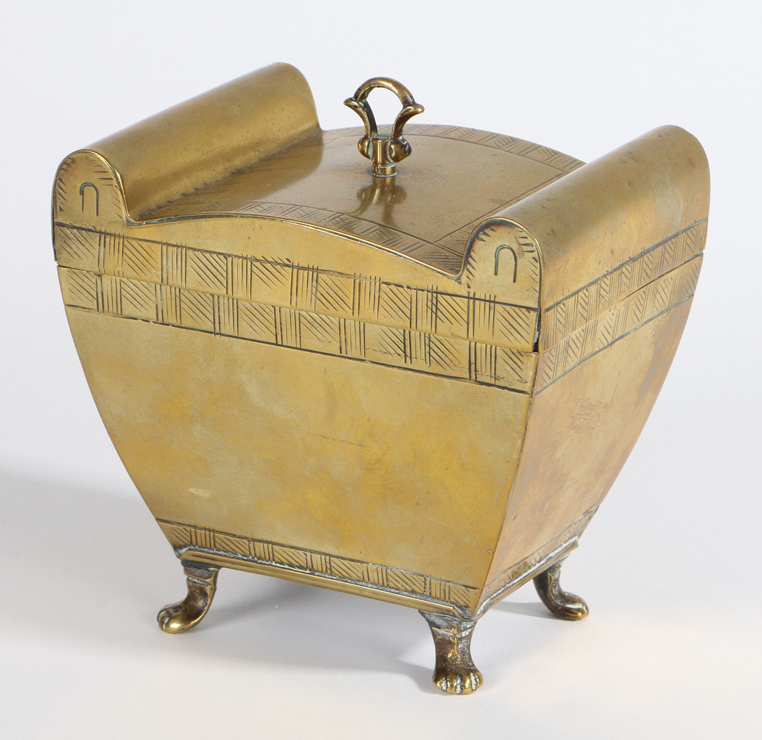 AN EARLY 19TH CENTURY SHEET-BRASS TEA CADDY, CIRCA 1820.