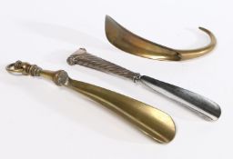 TWO 19TH CENTURY BRASS SHOEHORNS AND A SILVER-HANDLED EXAMPLE, ENGLISH (3).