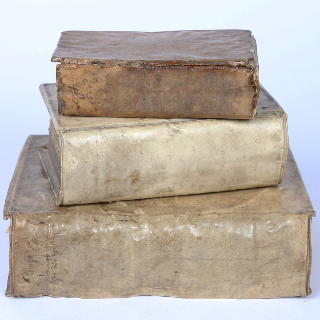 THREE 16TH/17TH CENTURY VELLUM BOUND BOOKS.