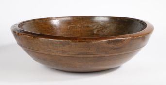 A LARGE GEORGE III SYCAMORE DAIRY BOWL, CIRCA 1800.