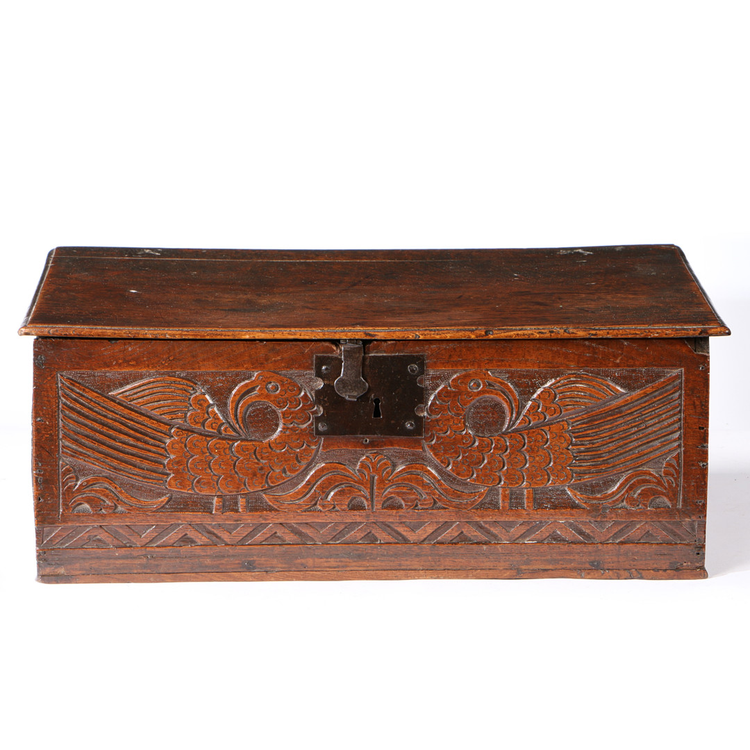 A CHARLES II BOARDED OAK BOX, CIRCA 1670.