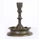 A RARE 15TH CENTURY BRASS-ALLOY SOCKET CANDLESTICK, FLEMISH, CIRCA 1450.