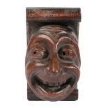 AN AMUSING 15TH CENTURY OAK MASK CORBEL, ENGLISH.