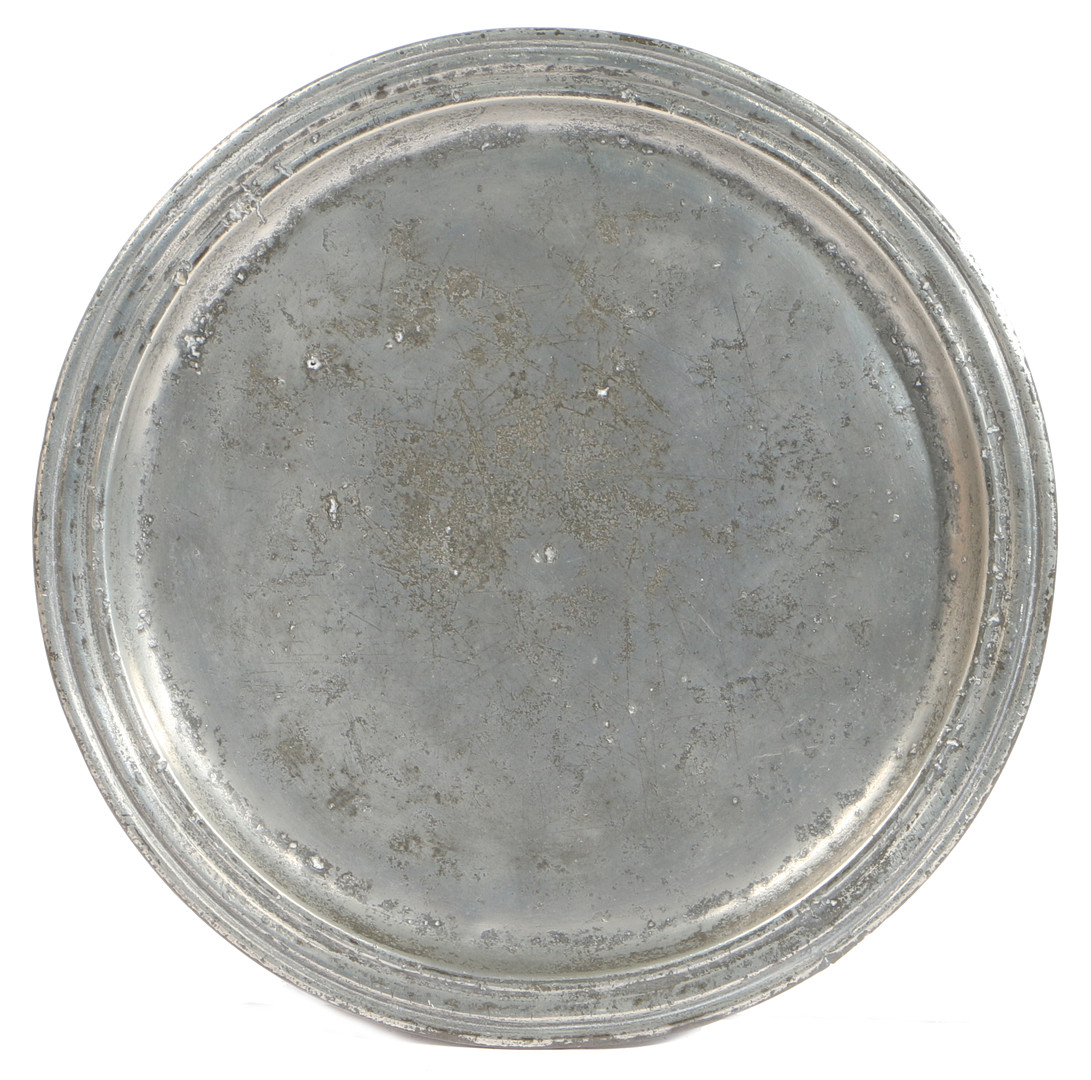 A QUEEN ANNE PEWTER MULTI-REED NARROW RIM PLATE, DEVONSHIRE, CIRCA 1705.