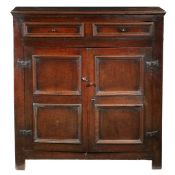 A RARE LATE 17TH CENTURY OAK LIVERY/FOOD CUPBOARD, WITH PIERCED SHELVES, ENGLISH, CIRCA 1680-1700.