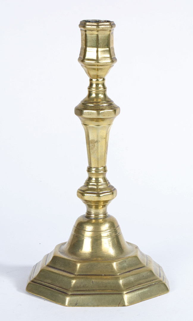 A MID-18TH CENTURY BRASS SOCKET CANDLESTICK, CIRCA 1750.