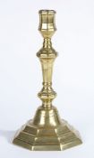 A MID-18TH CENTURY BRASS SOCKET CANDLESTICK, CIRCA 1750.