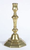 A MID-18TH CENTURY BRASS SOCKET CANDLESTICK, CIRCA 1750.