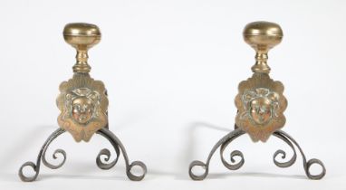 A PAIR OF BRASS AND IRON ANDIRONS/FIRE-DOGS, FLEMISH, CIRCA 1700.